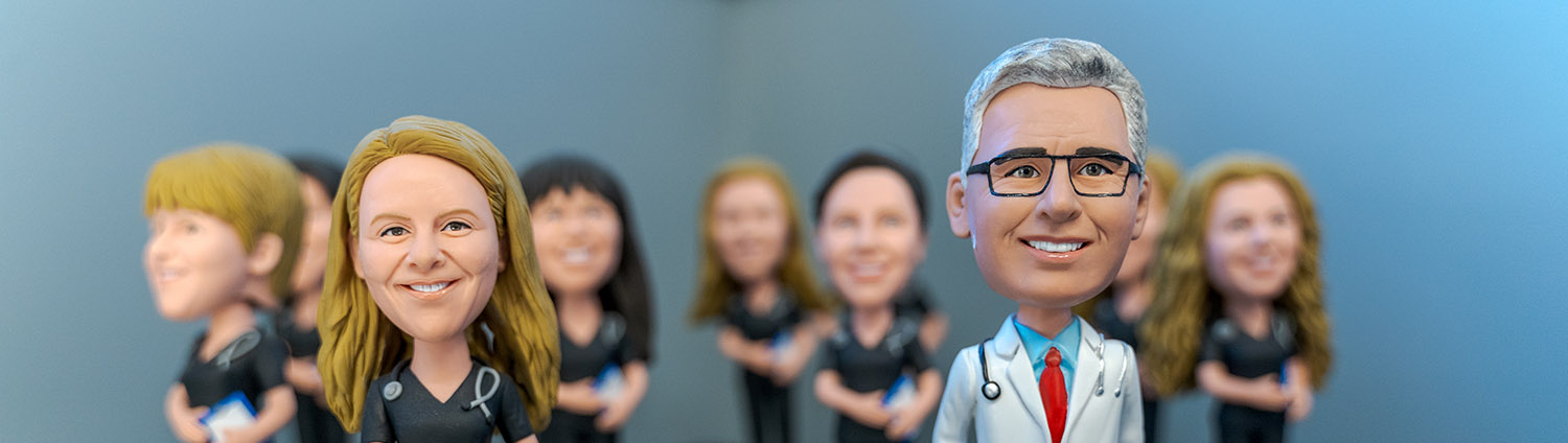 dr. clarizio office bobble heads